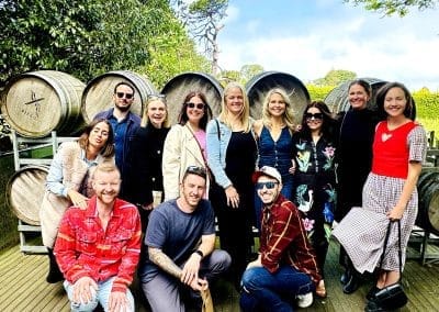 Group of friends posing at winery.