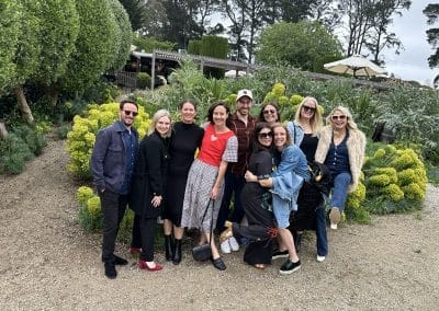 Group of friends posing at winery.
