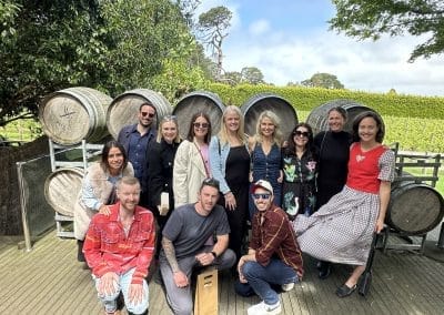 Group of friends posing at winery.