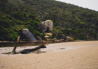 Beach with large rock formations.