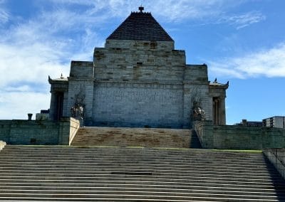 Webpage showing attachment details for a stone memorial photo with stepped base and pyramid-shaped roof
