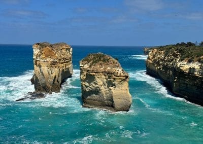 Scenic coastal rock formations surrounded by turquoise waters on the Great Ocean Road